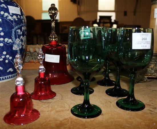 A Victorian cranberry glass bell and 6 green wine glasses & 2 others